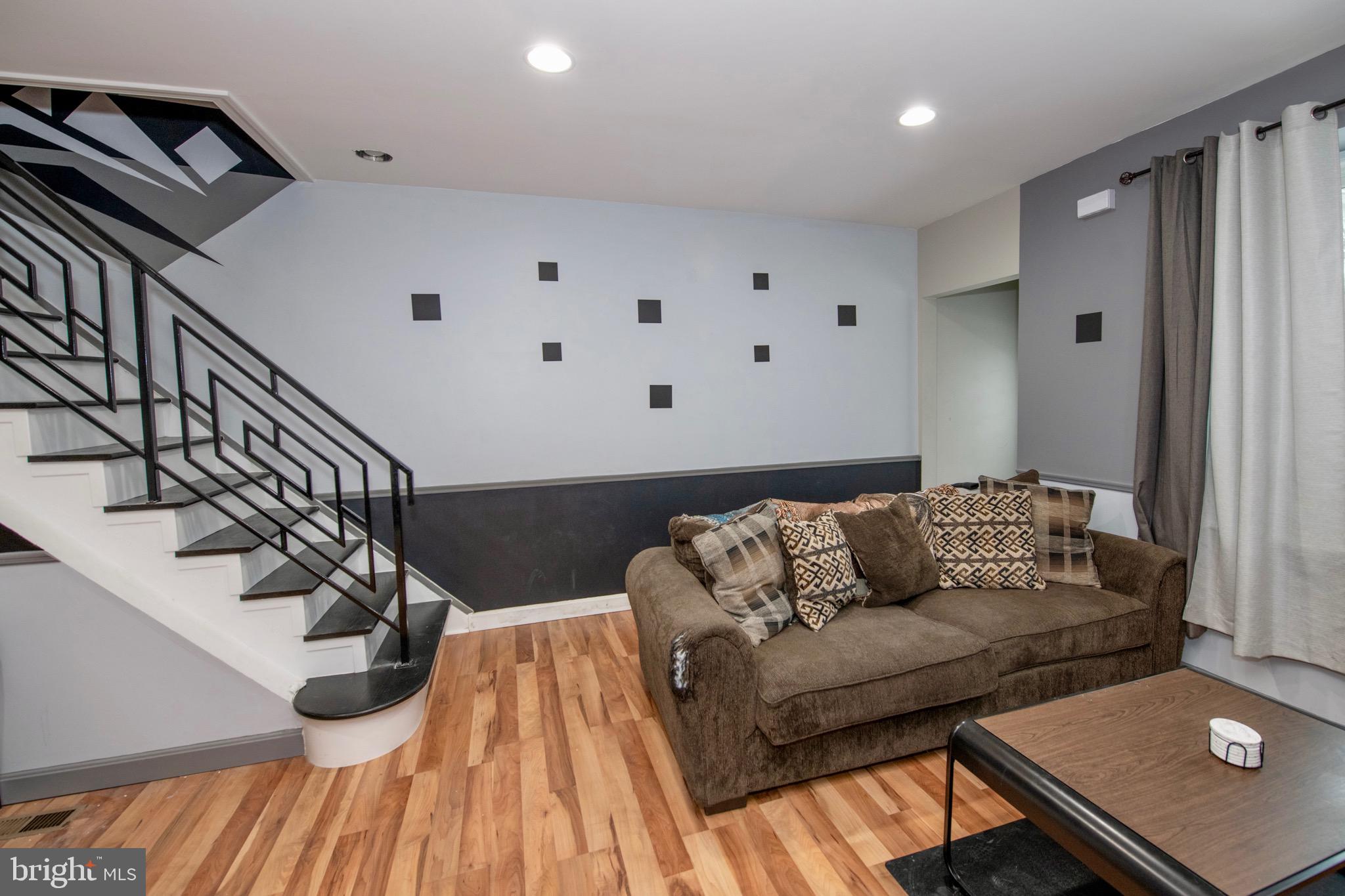 4930 Pulaski Avenue Philadelphia, PA 19144 - Photo 3 of 21 a living room with furniture and wooden floor