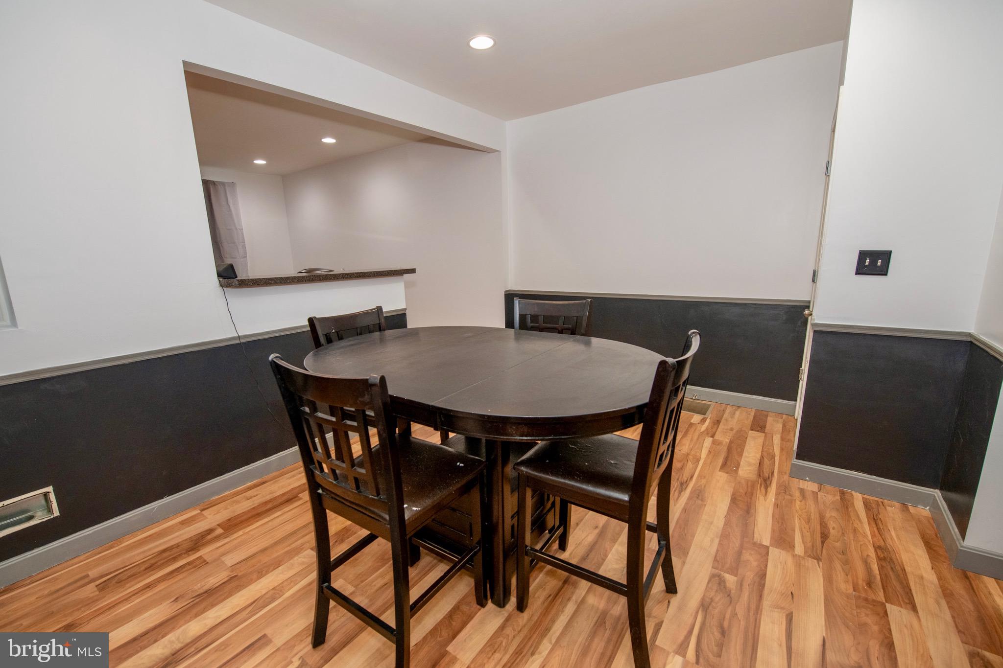 4930 Pulaski Avenue Philadelphia, PA 19144 - Photo 10 of 21 a view of a dining room with furniture and wooden floor