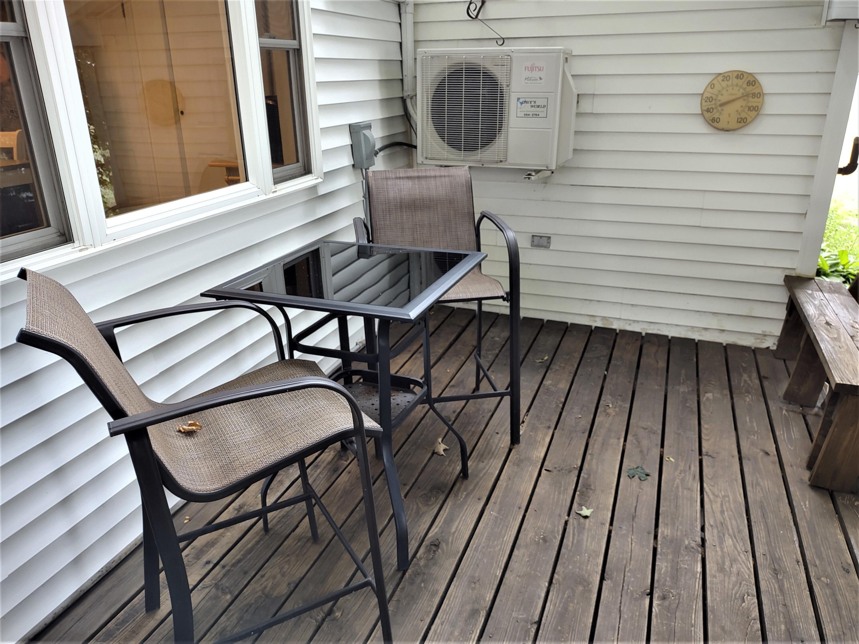 35 Hudson Road Corinth, ME 04427 - Photo 38 of 46 Back Deck_Heat Pump