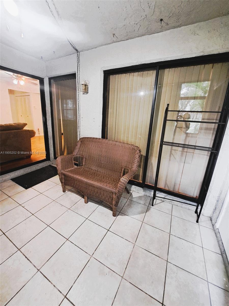 11532 Northwest 10th Street, Unit 11532 Pembroke Pines, FL 33026 - Photo 10 of 16 a room with windows