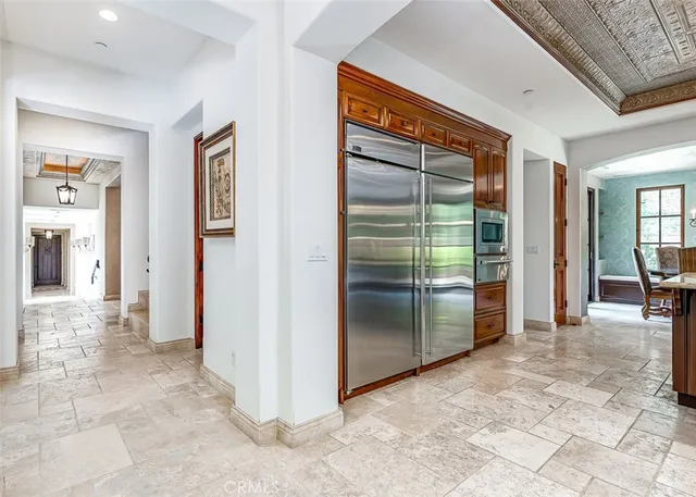 a view of a room with a chandeliers