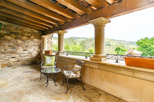 a spacious bathroom with a tub sink and mirror