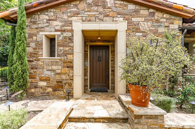 a front view of a house with parking