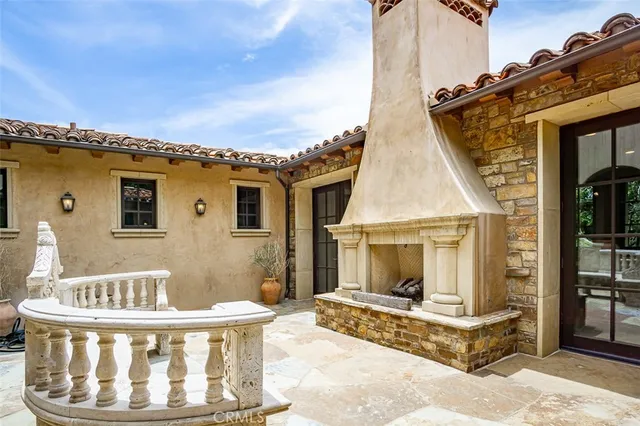 a front view of a house with glass windows