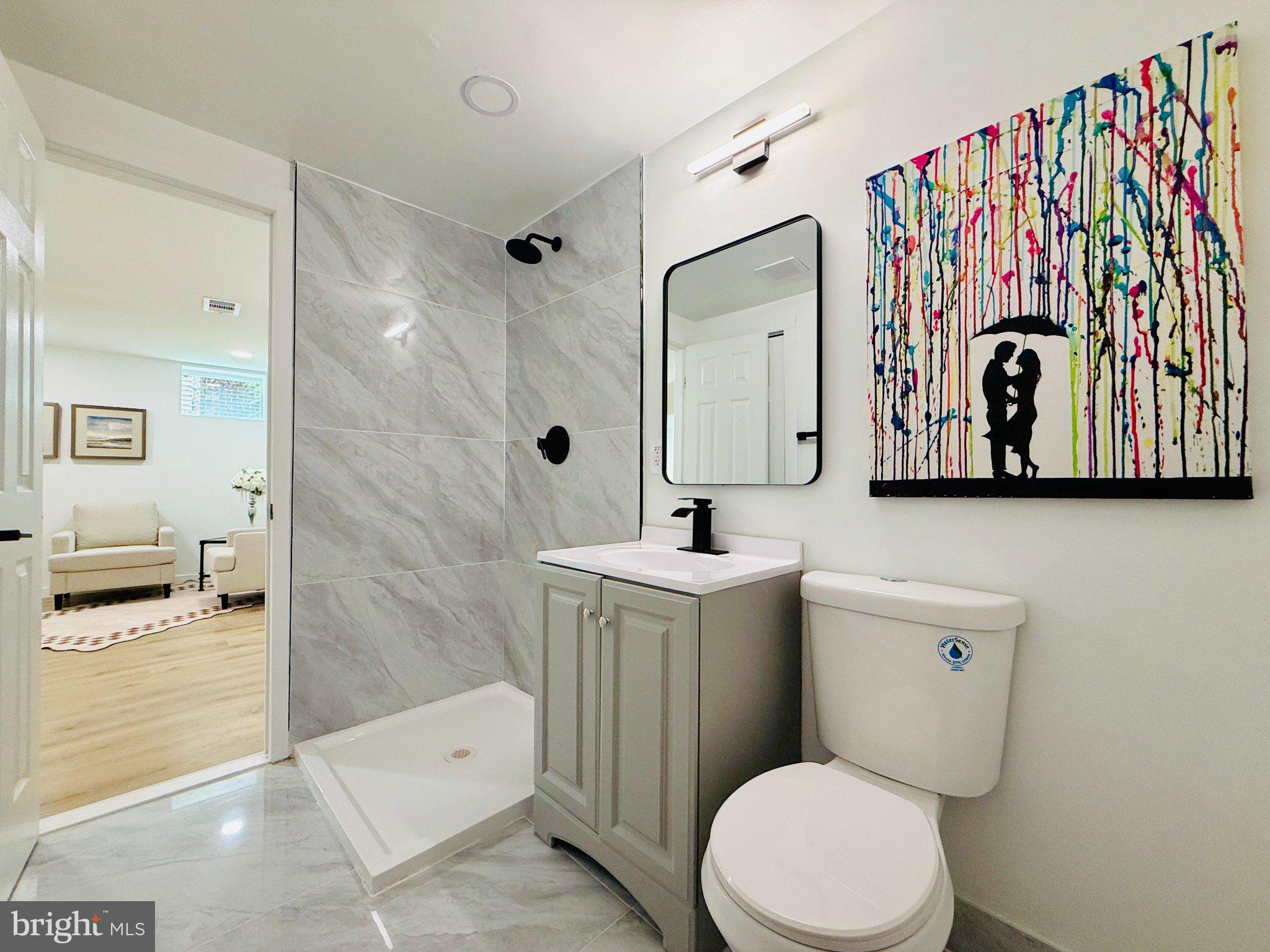 815 Whitehall Street Silver Spring, MD 20901 - Photo 32 of 39 Chic bathroom with artistic flair.