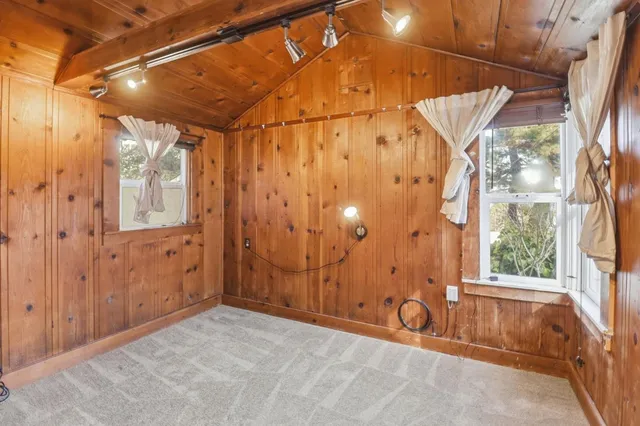 a bathroom with a tub and shower