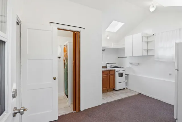 a bathroom with a sink a bath tub and a shower