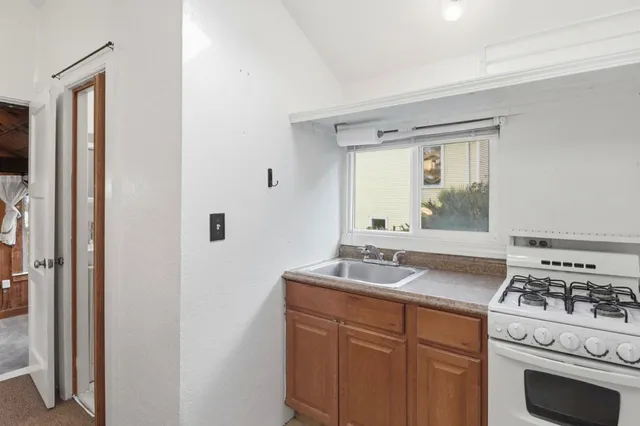 a view of a sink and a mirror