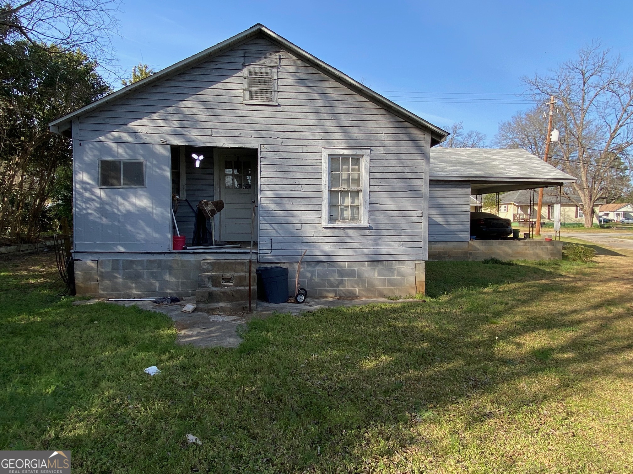 912 Thomas Street Macon, GA 31206 - Photo 22 of 23 a front view of a house with a yard