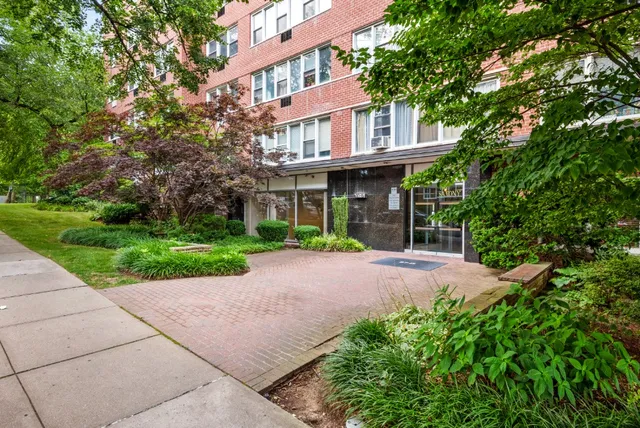 a view of a building with a garden