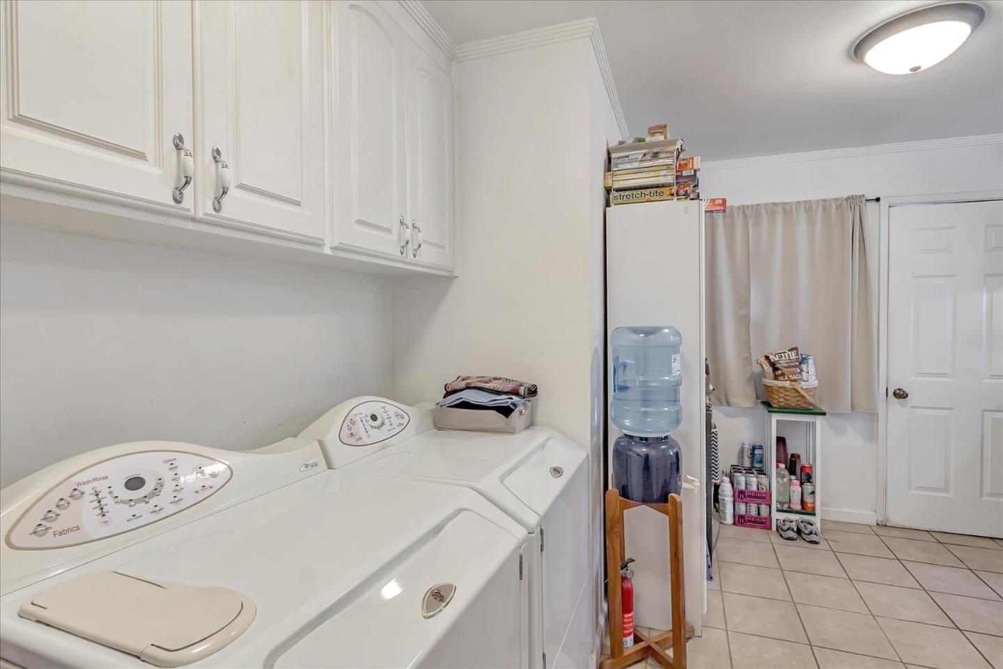 22620 Alcalde Road Cupertino, CA 95014 - Photo 31 of 39 a utility room with dryer and washer