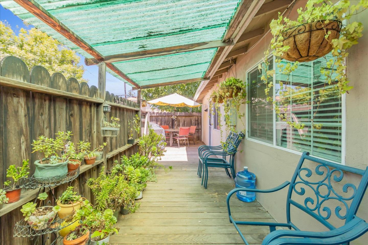 22620 Alcalde Road Cupertino, CA 95014 - Photo 36 of 39 a view of a chairs and table in the patio