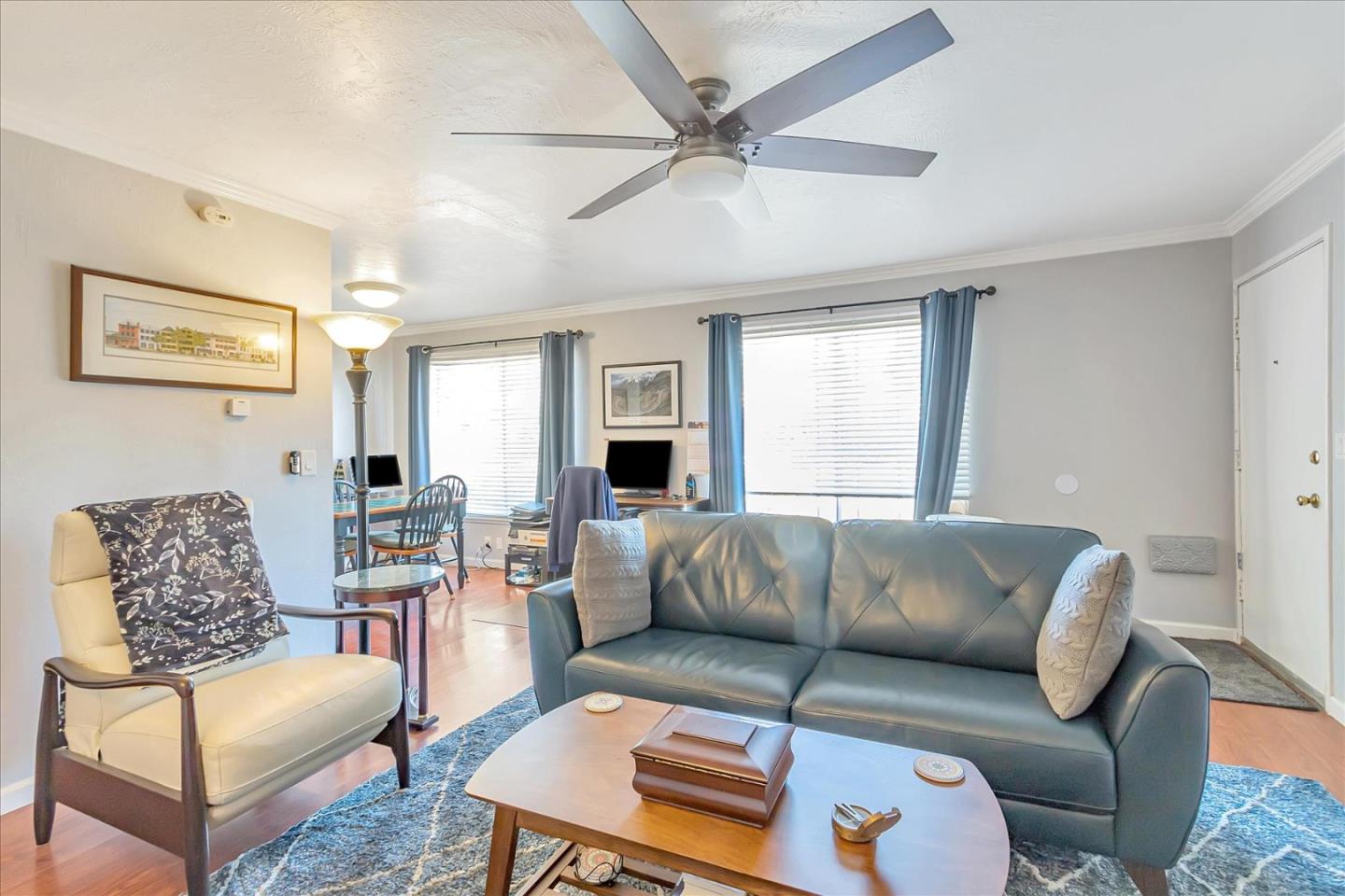 22620 Alcalde Road Cupertino, CA 95014 - Photo 9 of 39 a living room with furniture and a large window
