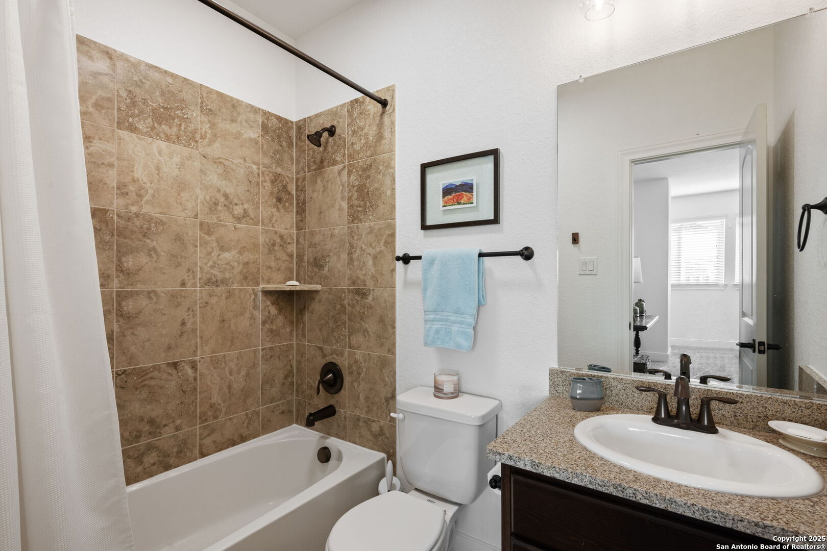 28827 Pfeiffers Gate Fair Oaks Ranch, TX 78015 - Photo 24 of 36 a bathroom with a granite countertop sink toilet and shower