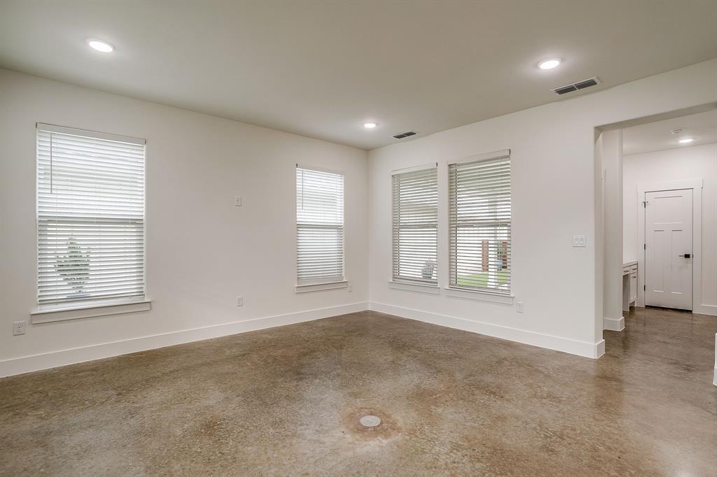 106 Cardinal Wds Granbury, TX 76049 - Photo 6 of 22 a view of an empty room with a window