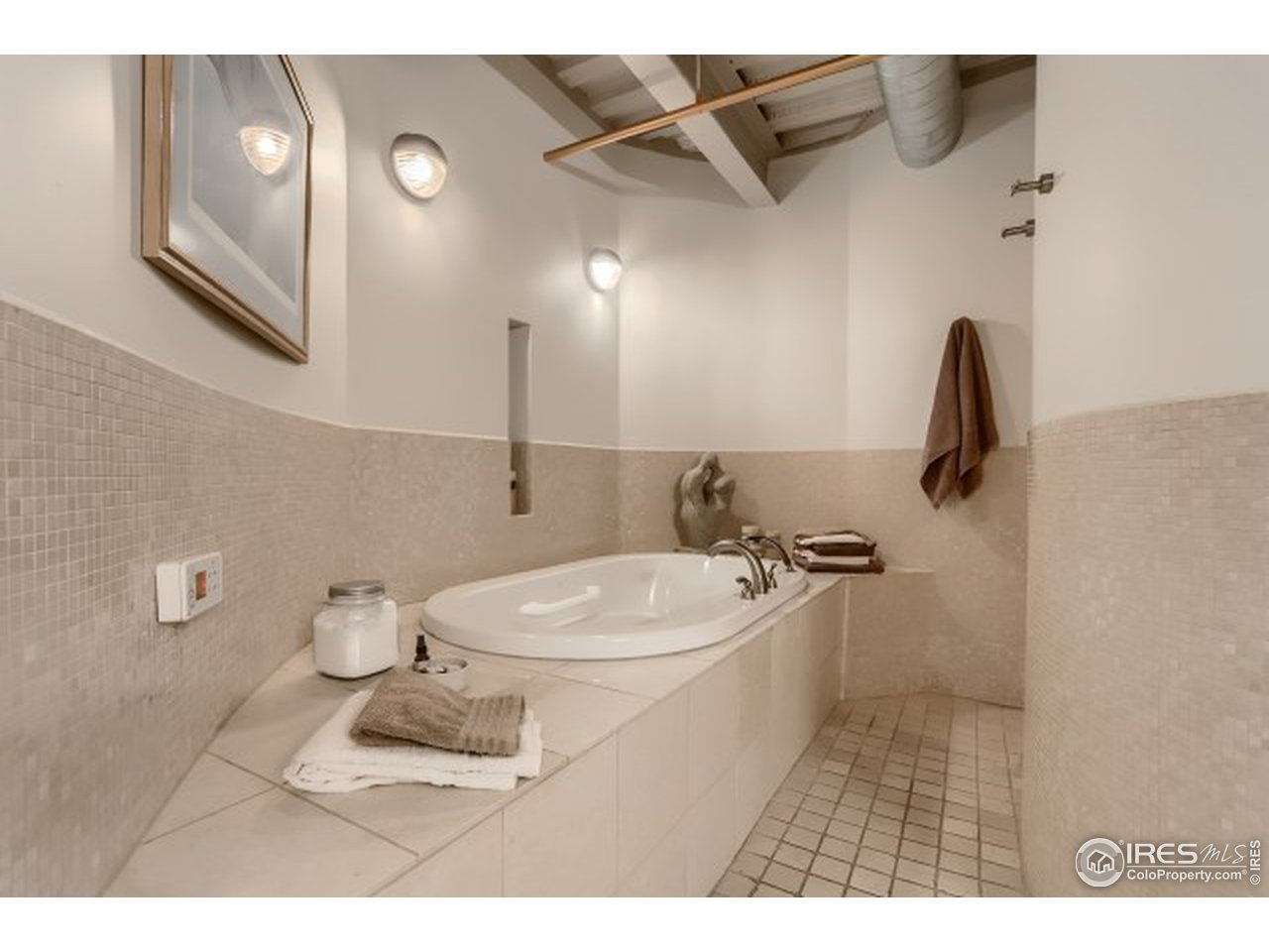 1360 Walnut Street, Unit 301 Boulder, CO 80302 - Photo 22 of 40 a bathroom with a sink toilet and a mirror