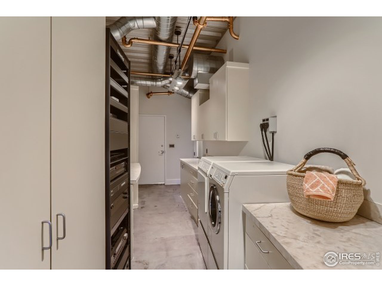 1360 Walnut Street, Unit 301 Boulder, CO 80302 - Photo 27 of 40 a utility room with dryer and washer