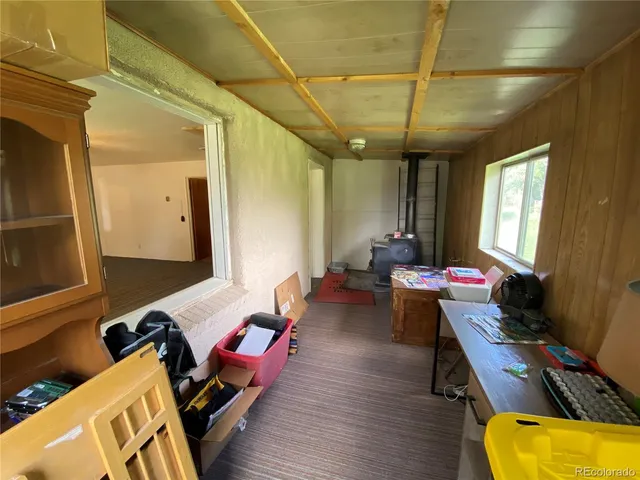 a room with furniture and wooden floor