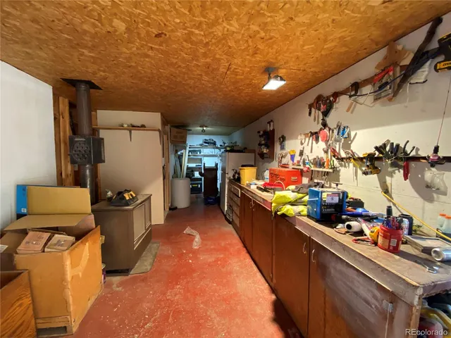 a refrigerator freezer sitting inside of a kitchen