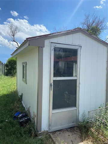 a backyard of a house with seating space