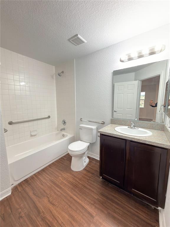 33 Sand Mountain Road Fort Meade, FL 33841 - Photo 7 of 9 a spacious bathroom with a bathtub shower sink mirror and toilet