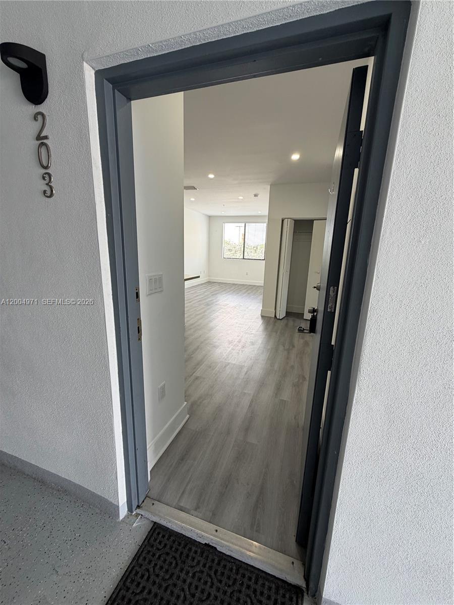853 East 24th Street, Unit 203 Hialeah, FL 33013 - Photo 2 of 13 a view of a hallway