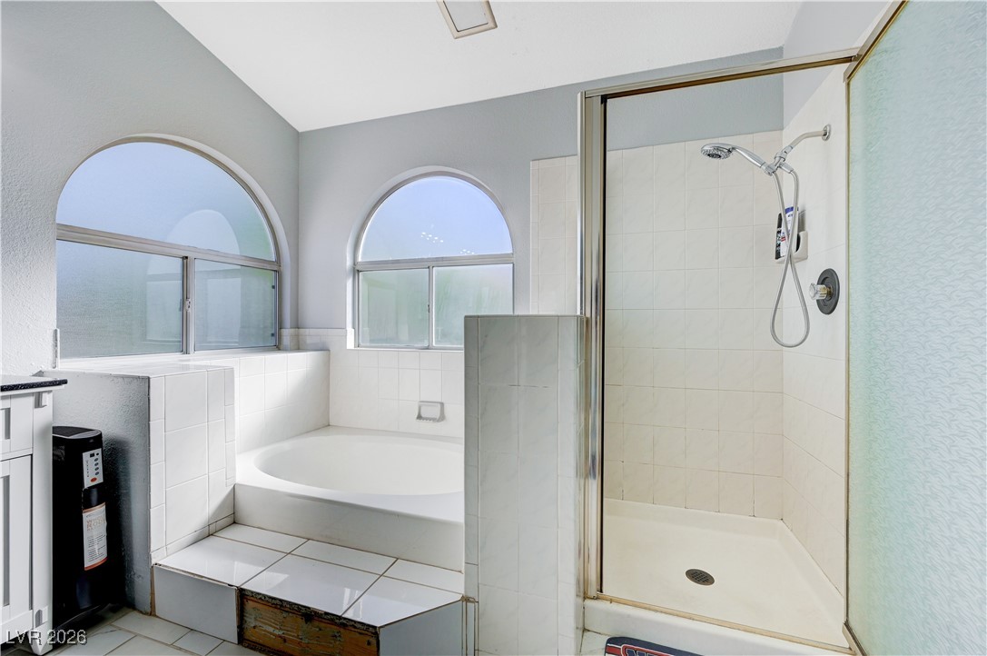 14 Barton Spring Circle Henderson, NV 89074 - Photo 34 of 64 Full bath featuring a garden tub and a stall shower