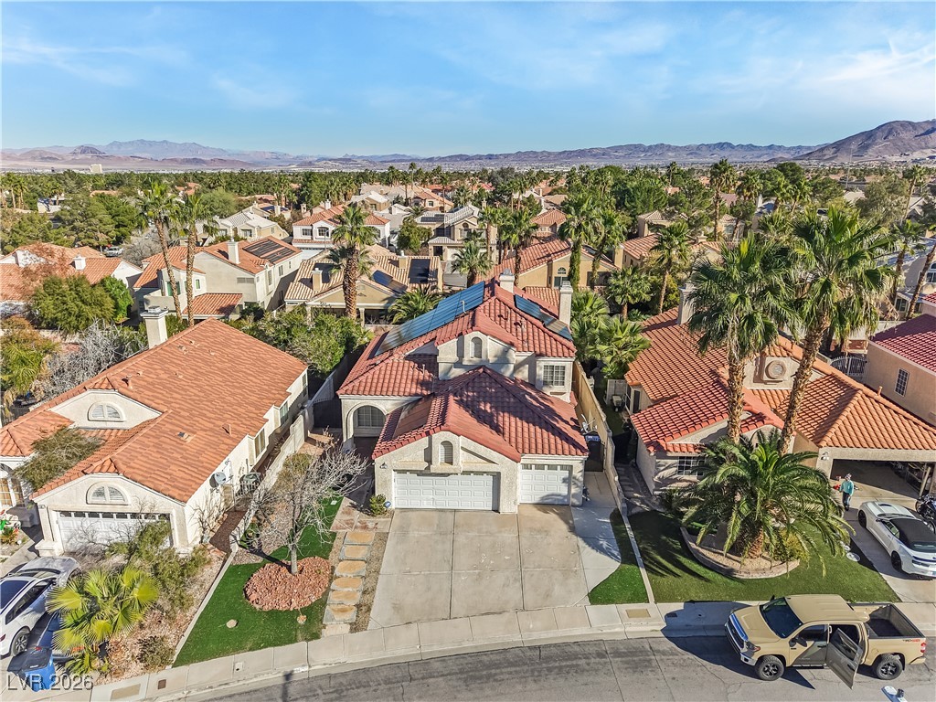 14 Barton Spring Circle Henderson, NV 89074 - Photo 58 of 64 Aerial perspective of suburban area featuring mountains