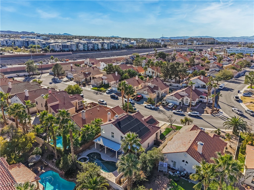 14 Barton Spring Circle Henderson, NV 89074 - Photo 61 of 64 Aerial view of residential area with mountains
