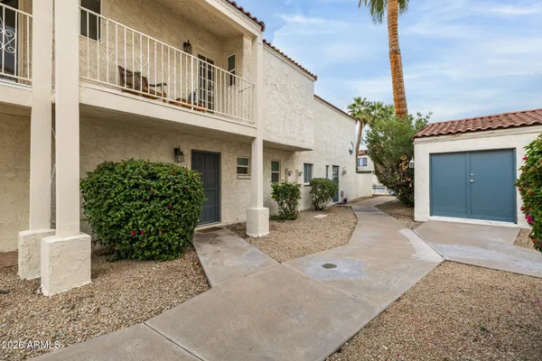 a view of a building with a street