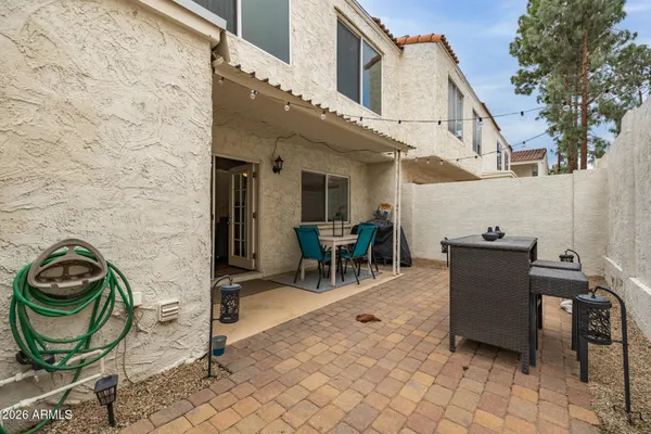 a view of a backyard with plants