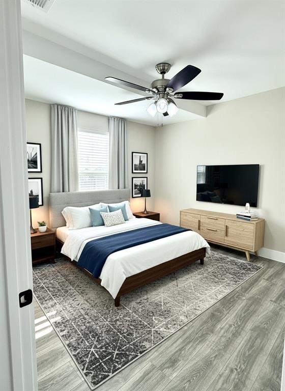 6164 Highway 289 Howe, TX 75459 - Photo 15 of 21 a bedroom with a bed and a flat screen tv