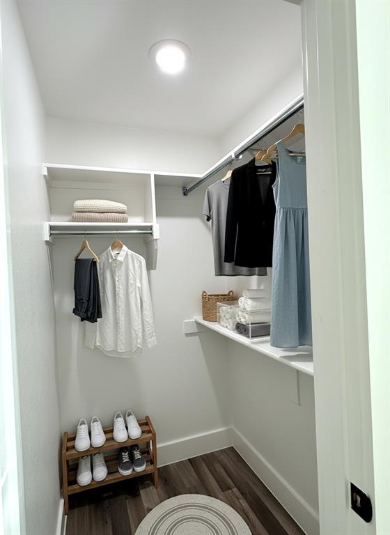 6164 Highway 289 Howe, TX 75459 - Photo 16 of 21 a view of walk in closet with clothes and shoes