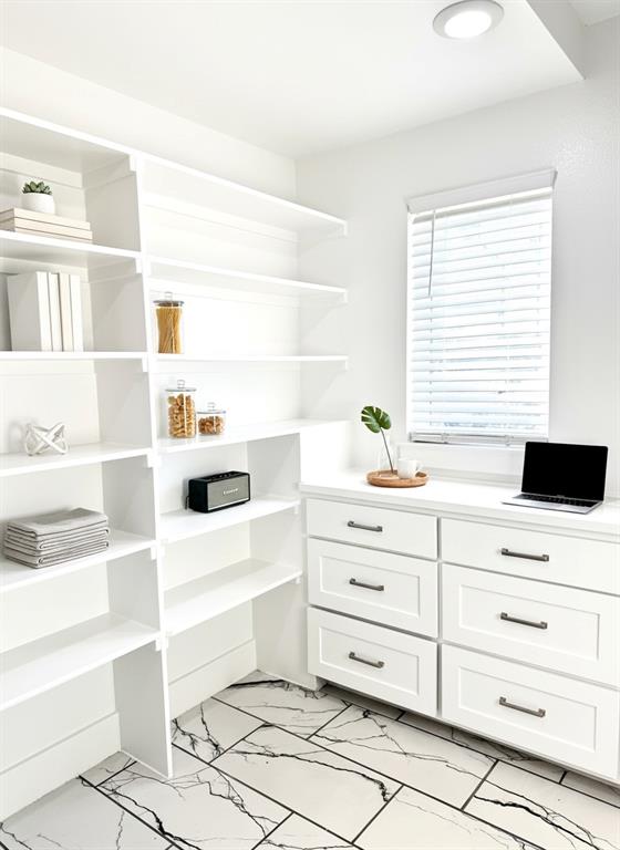 6164 Highway 289 Howe, TX 75459 - Photo 7 of 21 a kitchen with a white stove top oven and white cabinets