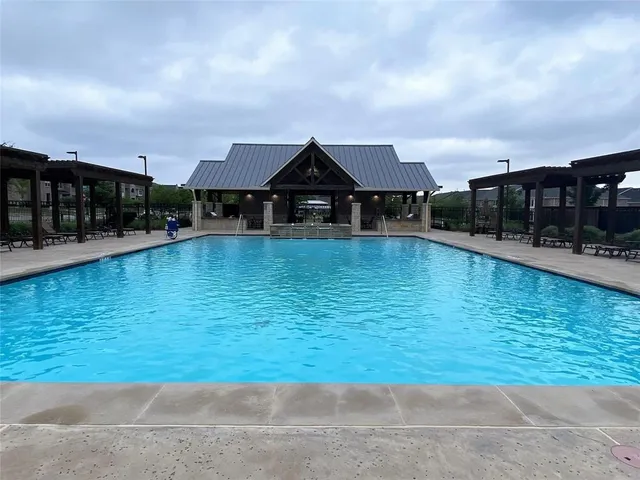 a view of house with yard