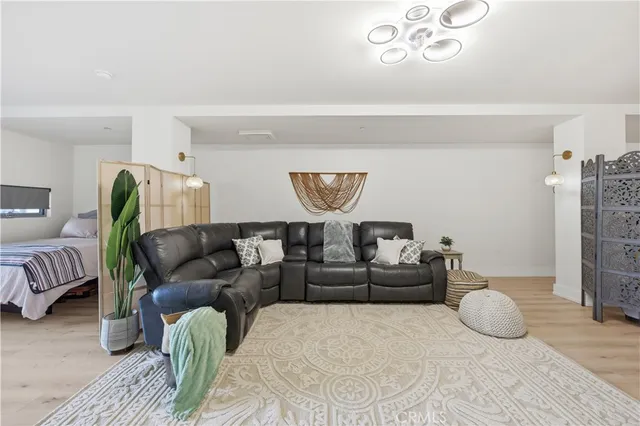 a bedroom with furniture and a couch