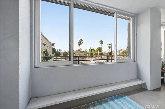 a view of a living room and a window