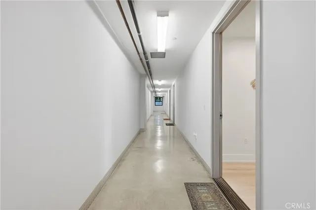 a view of a living room and bathroom