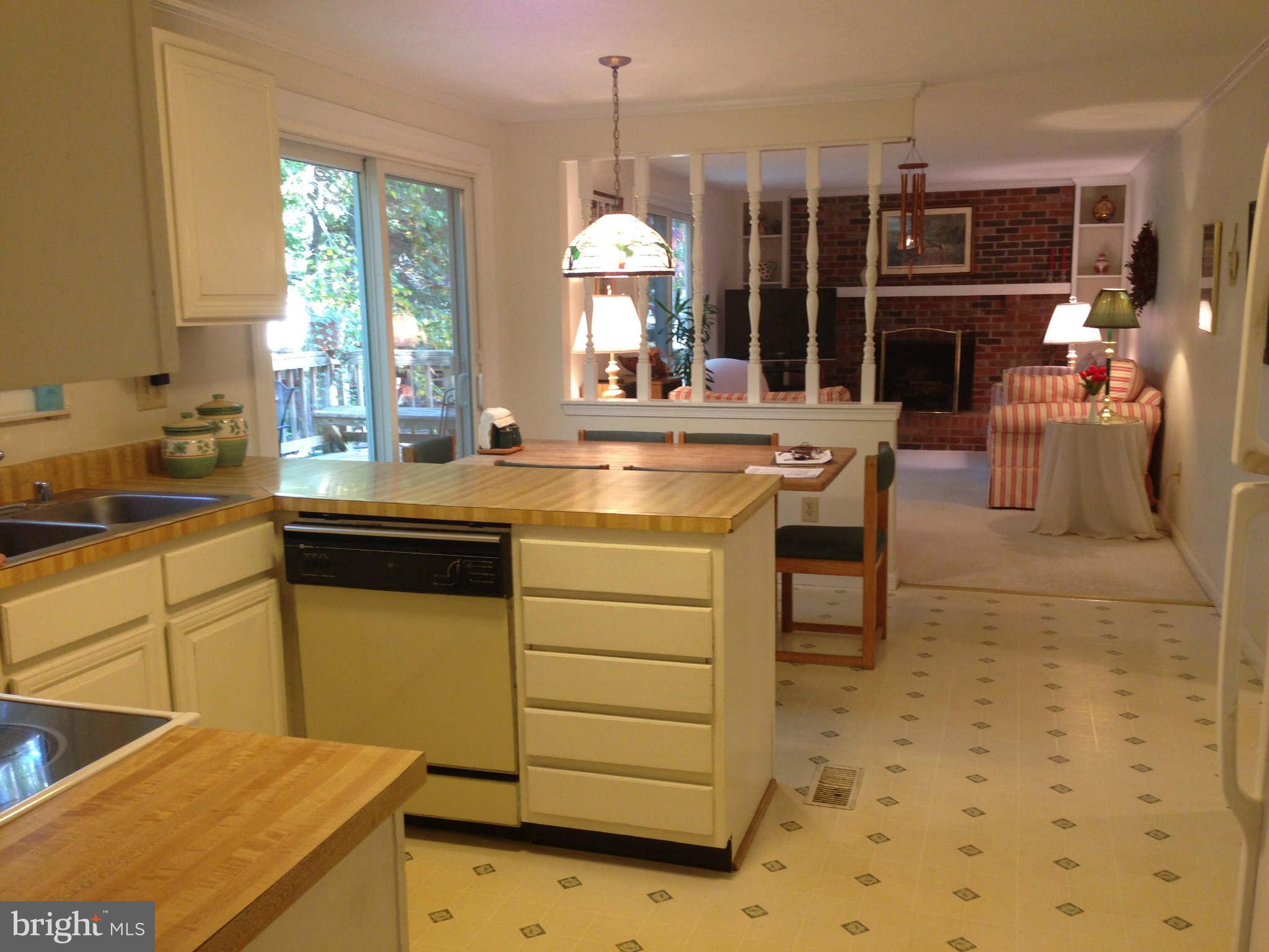 8066 Athena Street Springfield, VA 22153 - Photo 10 of 30 a kitchen with table and chairs