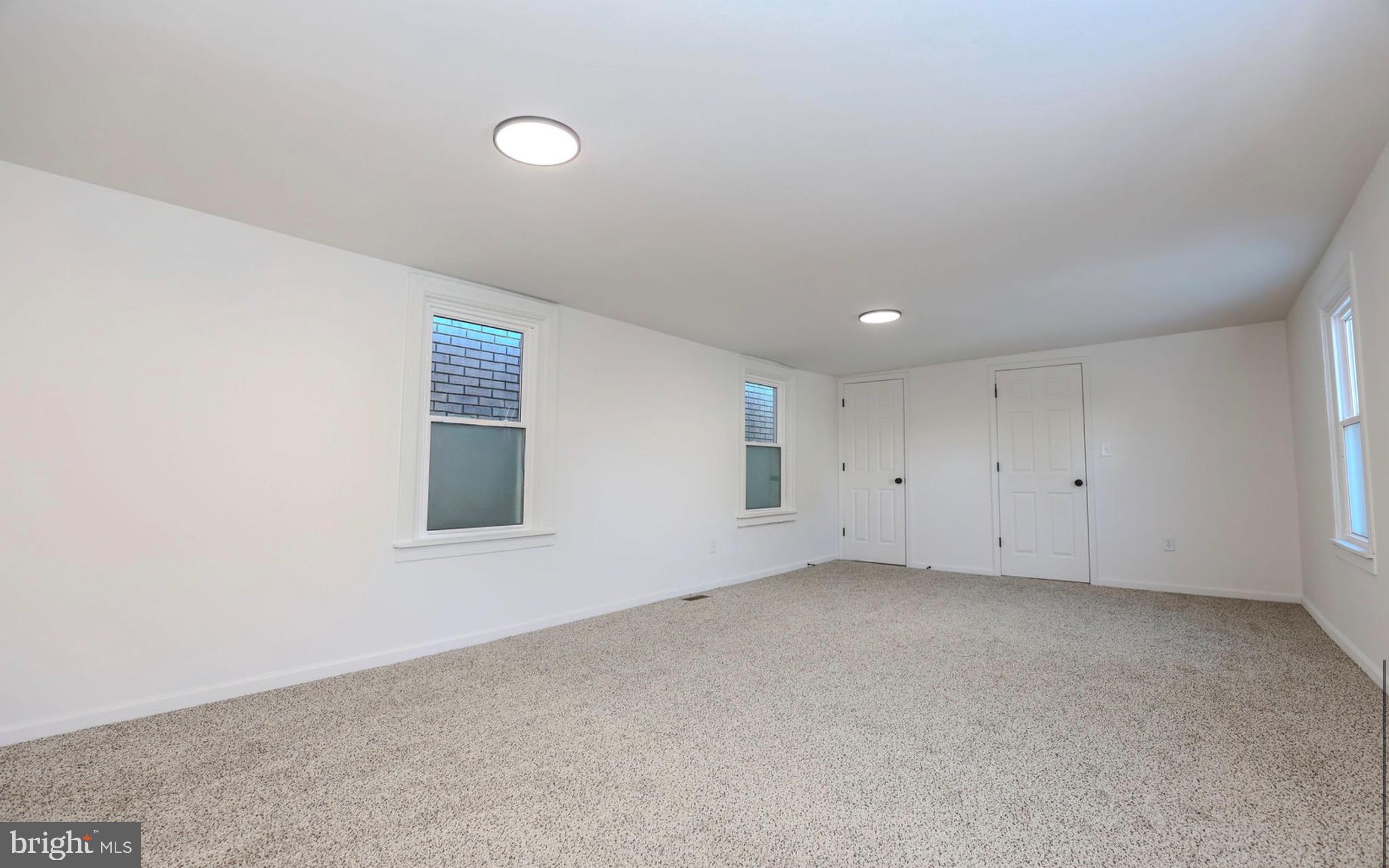 1234 Main Street Harrisburg, PA 17113 - Photo 30 of 36 an empty room with a empty space and windows