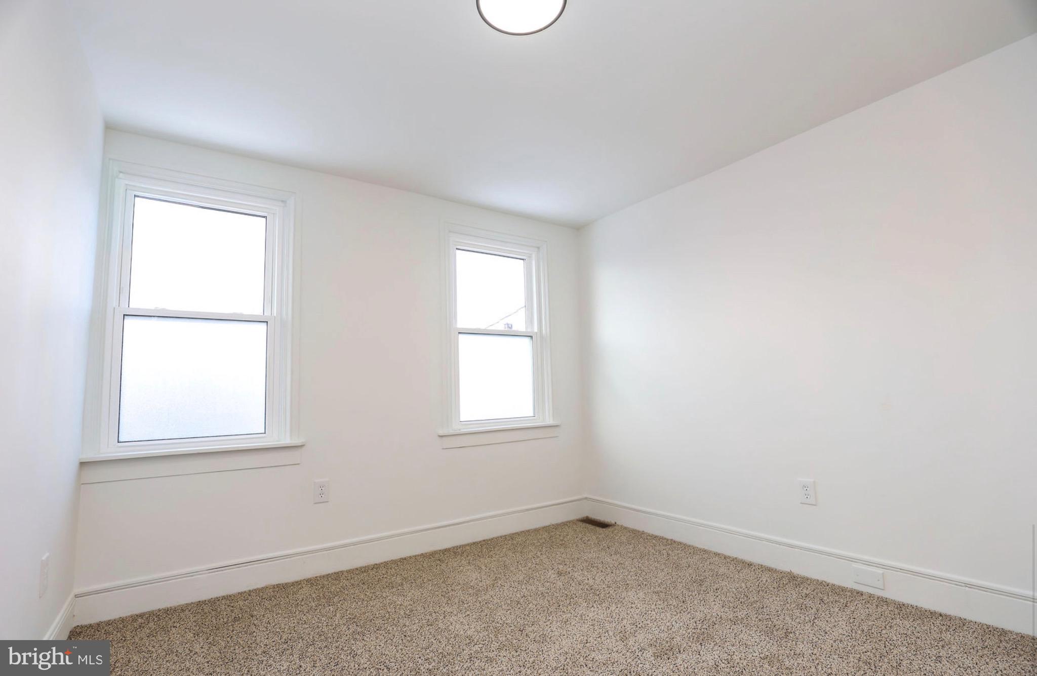 1234 Main Street Harrisburg, PA 17113 - Photo 35 of 36 an empty room with windows