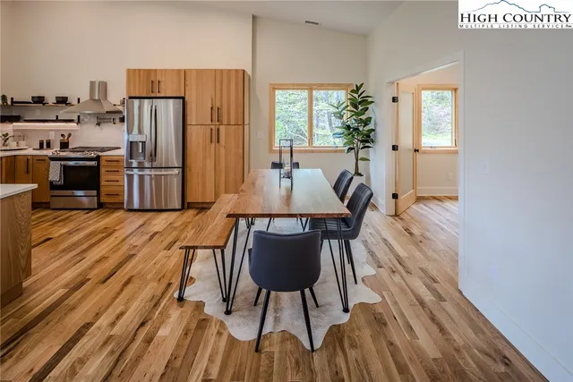 a view of a balcony with wooden floor