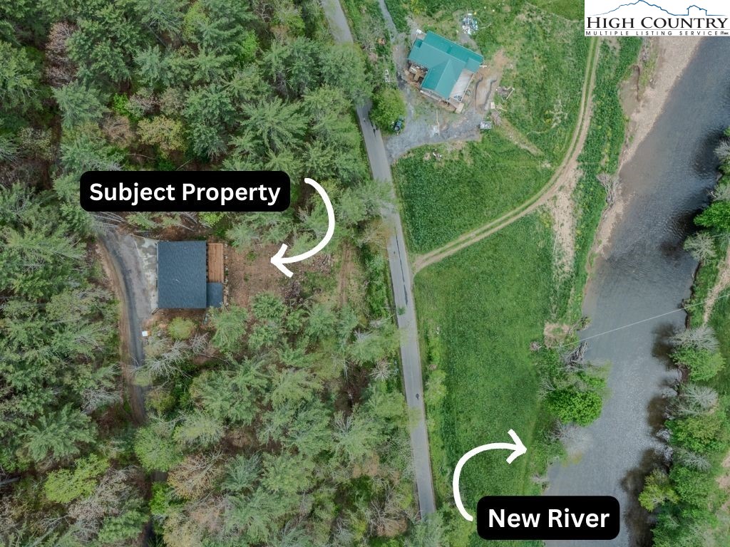 281 New Riv Farms Road Fleetwood, NC 28626 - Photo 45 of 50 a sign broad on the side of the road