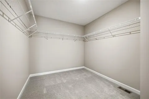 a view of a room with racks on the wall