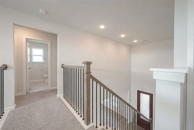 a view of a hallway with entryway