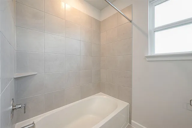 a bathroom with a bathtub