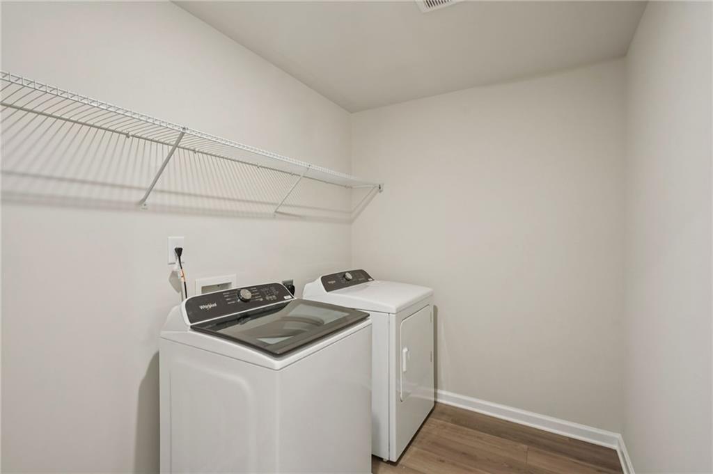 1458 High Fls Lane Grayson, GA 30017 - Photo 32 of 42 a utility room with dryer and washer