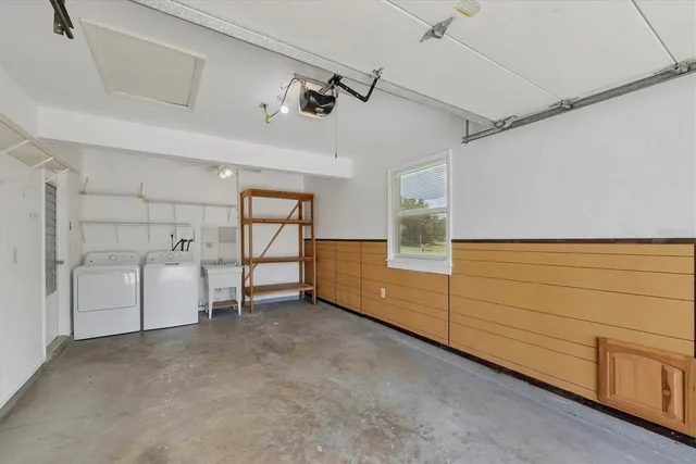 a view of an empty room with a large window