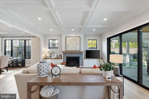 a spacious bedroom with a large bed and a dresser