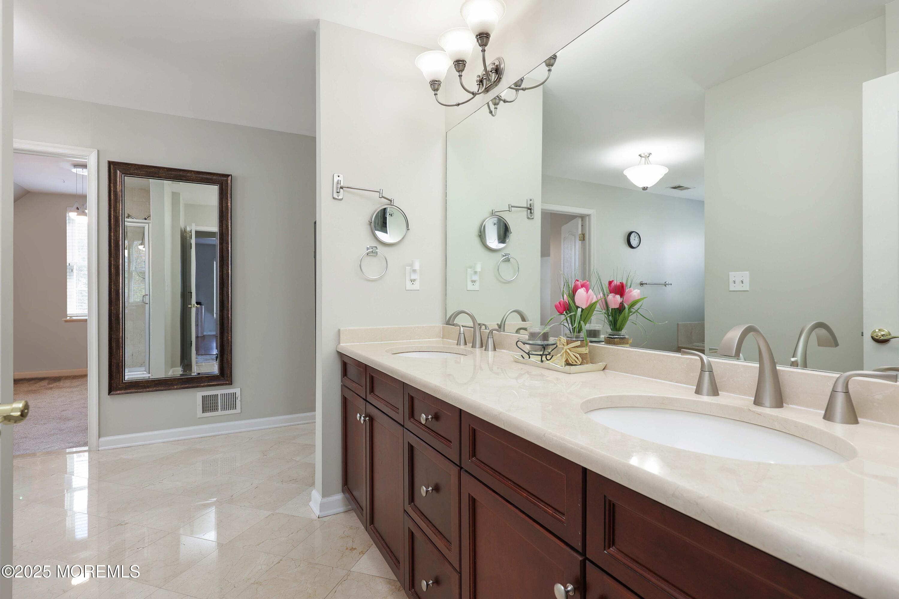 1 Boyd Road Hazlet, NJ 07730 - Photo 24 of 52 a bathroom with a sink double vanity and a mirror